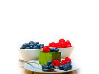 Image showing green tea matcha mousse cake with berries