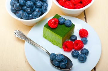 Image showing green tea matcha mousse cake with berries