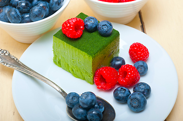 Image showing green tea matcha mousse cake with berries