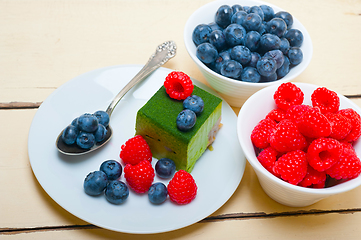 Image showing green tea matcha mousse cake with berries