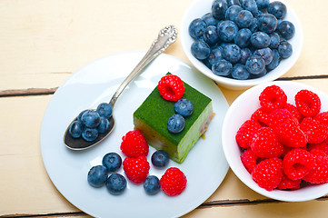 Image showing green tea matcha mousse cake with berries