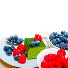 Image showing green tea matcha mousse cake with berries