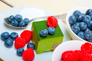 Image showing green tea matcha mousse cake with berries