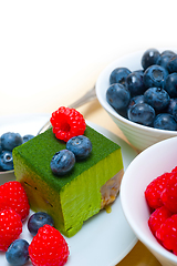 Image showing green tea matcha mousse cake with berries