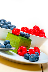 Image showing green tea matcha mousse cake with berries