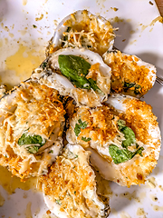 Image showing Fried rockerfeller oyster shell with sauce