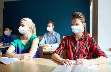 Image showing group of students in masks at school lesson