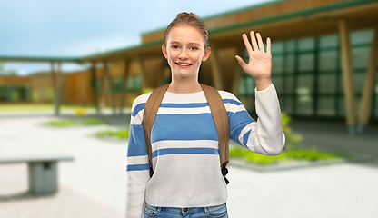 Image showing smiling teenage student girl with school bag