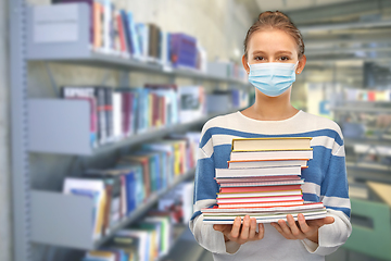 Image showing teenage student girl with books at library