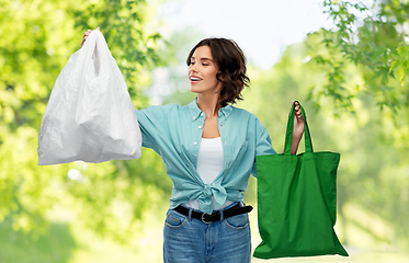 Image showing woman with plastic and reusable shopping bag