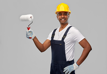 Image showing happy indian painter or builder with paint roller