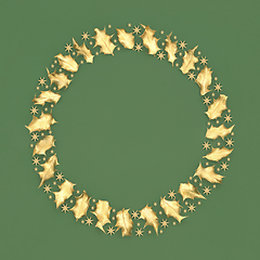 Image showing Abstract Christmas Wreath of Gold Stars and Holly Leaves