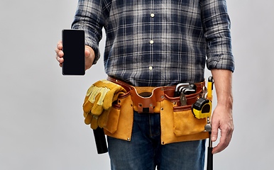 Image showing worker or builder with phone and working tools