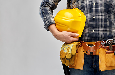 Image showing worker or builder with helmet and working tools