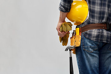 Image showing worker or builder with helmet and working tools