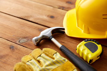 Image showing different work tools on wooden boards