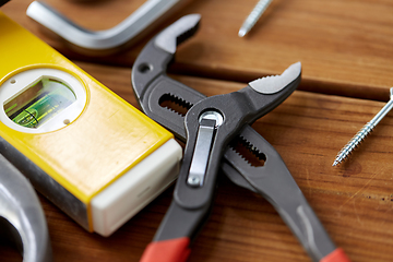 Image showing adjustable wrench and other different work tools