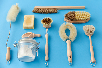 Image showing cleaning brushes and soda powder with scoop in jar