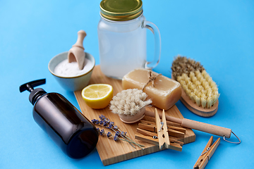 Image showing washing soda, soap, brushes, lemon and clothespins