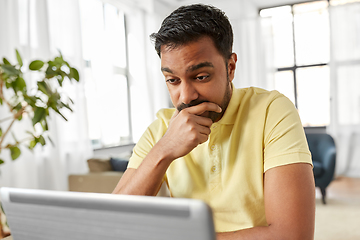 Image showing indian man with laptop working at home office