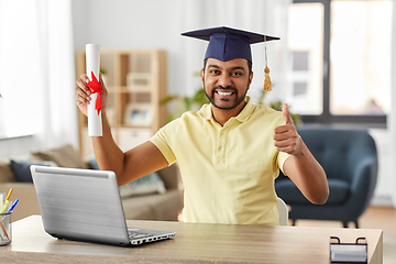 Image showing indian student with laptop and diploma at home