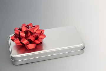 Image showing Silver Grey Brushed Metal Gift Box and Red Bow
