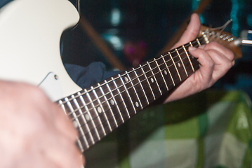 Image showing playing the guitar