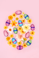 Image showing Easter Egg Shape with Chocolate Eggs and Flowers