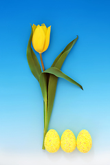 Image showing Abstract Yellow Tulip Flower with Easter Eggs