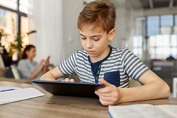 Image showing student boy with tablet computer learning at home