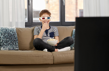 Image showing boy in 3d movie glasses and watching tv at home