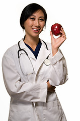 Image showing Doctor with apple