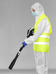 Image showing sanitation worker in hazmat with pressure washer