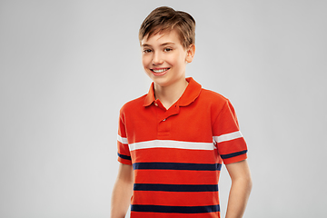 Image showing portrait of happy smiling boy in red polo t-shirt