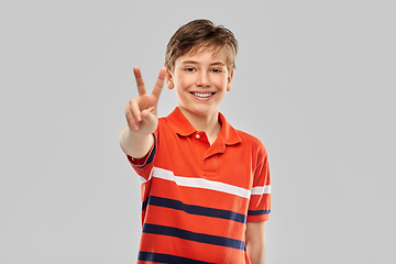 Image showing portrait of happy smiling boy in red polo t-shirt