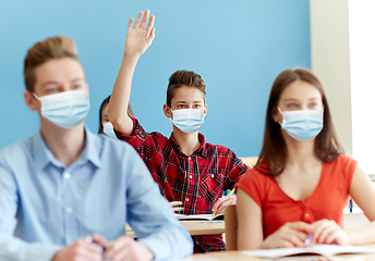 Image showing group of students in masks at school lesson