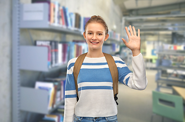 Image showing smiling teenage student girl with school bag