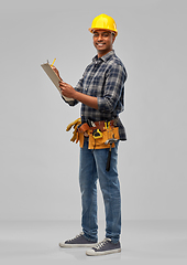 Image showing happy builder with clipboard and pencil