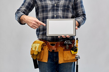 Image showing male builder with working tools showing tablet pc