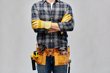 Image showing builder with working tools, goggles and gloves on