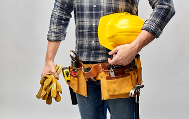 Image showing worker or builder with helmet and working tools