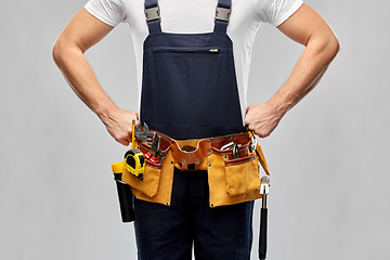 Image showing worker or builder in overall with working tools