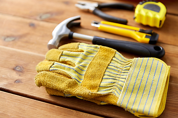 Image showing different work tools on wooden boards