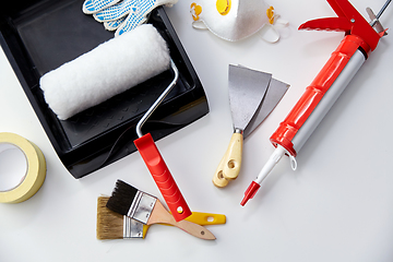 Image showing different painting work tools on white background