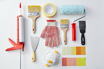 Image showing different painting work tools on white background