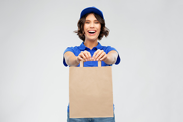 Image showing delivery woman with takeaway food in paper bag