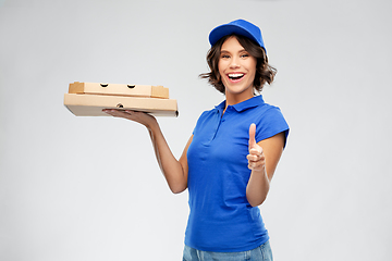 Image showing delivery woman with takeaway pizza boxes