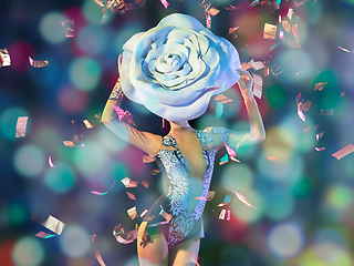 Image showing Young female dancer with huge floral hat in neon light on gradient background in flying confetti