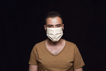 Image showing Man in protective mask, coronavirus prevention, protection concept