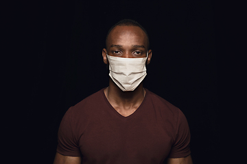 Image showing Man in protective mask, coronavirus prevention, protection concept